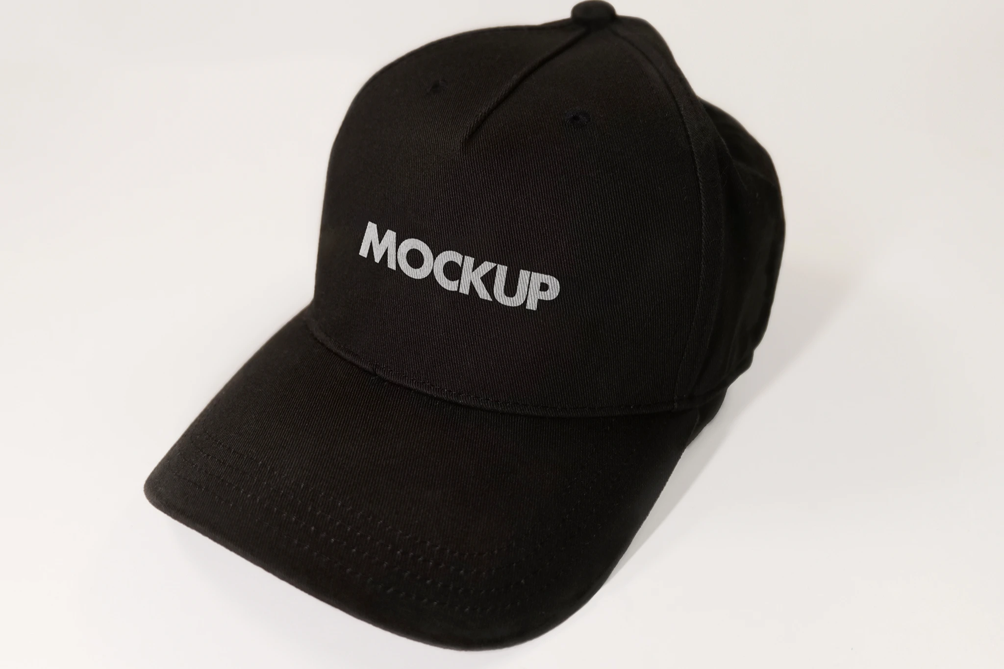Black Hat Mockup with Photo Realistic Fabric Texture on a Clean White Background